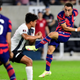 Sergiño Dest shoots and scores a goal against Costa Rica.